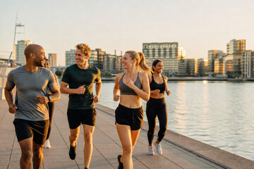 Fototapeta premium Outdoor social running club at sunrise