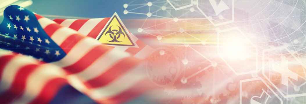 American flag, test tubes and biohazard sign. The concept of American biolabs and research centers.