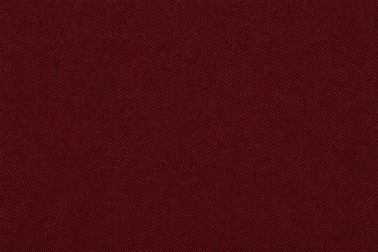 Maroon denim fabric texture with a fine diagonal twill weave and subtle matte finish. Durable textile surface ideal for upholstery, fashion, clothing, furniture, and seamless backgrounds.
