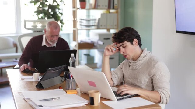 Frustrated male managers grapple with business failure . High quality 4k footage