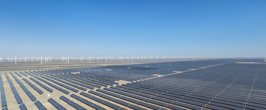 Massive Solar Panel Arrays With Wind Turbines On Horizon