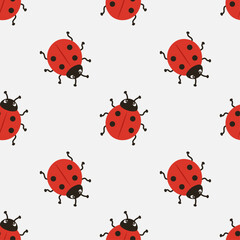 Fototapeta premium Ladybug seamless pattern with red ladybird insects on light background for kids textile, nursery wallpaper, apparel, wrapping paper and spring nature design. Vector illustration.