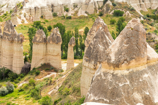 Iconic fairy chimneys rock formations in Love Valley, Cappadocia