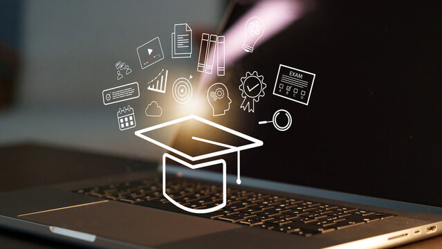 E learning tools and symbols surrounding a laptop in a study environment