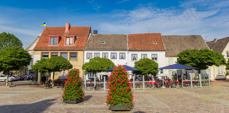 Panorama of the market square with restaurants and cafes in Schleswig, Germany