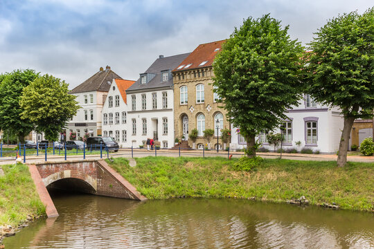 Historic houses and bridge at the canal in Friedrichstadt, Germany