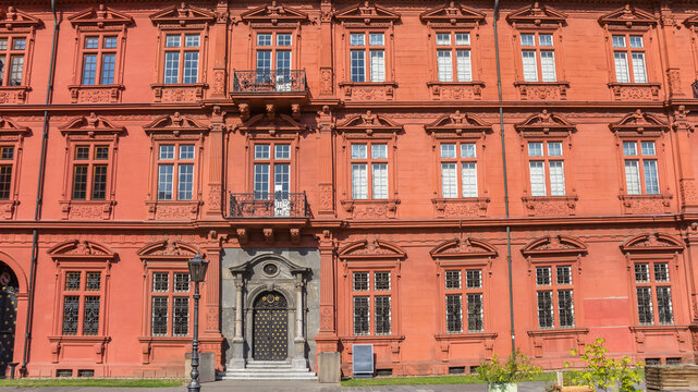 Side wall with gray door of the palace in Mainz, Germany