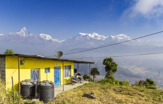 Yellow cabin overlooking the Annapurna range in Nepal