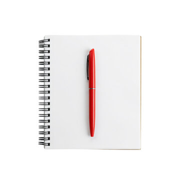 A red ballpoint pen resting on of a white spiral bound notebook with blank pages isolated on a transparent background