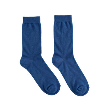 A pair of solid blue cotton crew socks for men or women, footwear isolated on a transparent background