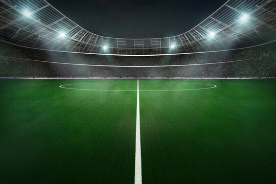 Soccer ball on the big textured soccer game field, stadium. Ready for game in the midfield