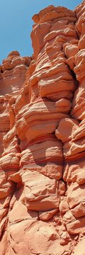 Rocky outcrop with layered sandstone formations, texture, pattern