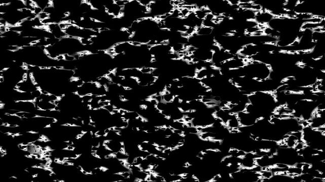 The artist creates abstract shapes using black and white colors on a large canvas in an art studio. Looping video clip.