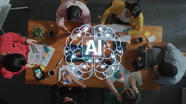 A diverse team collaborates on artificial intelligence solutions in a modern workspace. Charts and digital tools facilitate innovative brainstorming for technology improvement. Raster