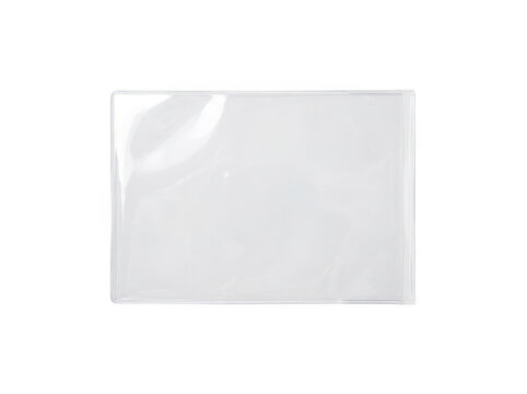Transparent plastic sleeve with rounded edges laid flat on a transparent surface.