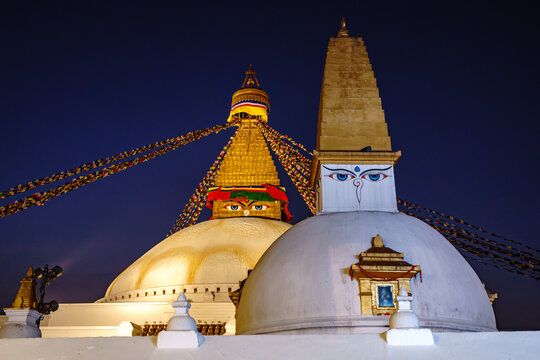 Nepal. Central. Kathmandu. Kathmandu Valley. Boudhanath. The Boudhanath stupa and a secondary stupa