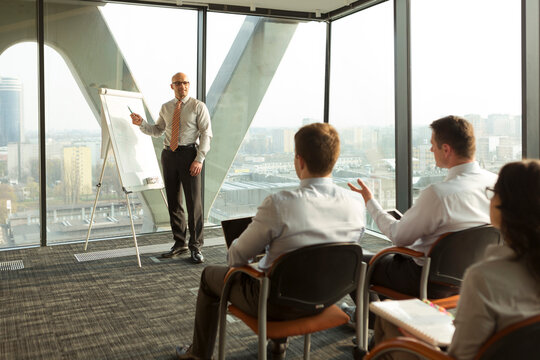 Group of businesspeople attending a seminar