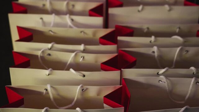 New Year corporate gifts souvenirs presentation for company employees, Christmas party presents exchange, gift bag package for conference participants, gift giving at office work, red white paper bags