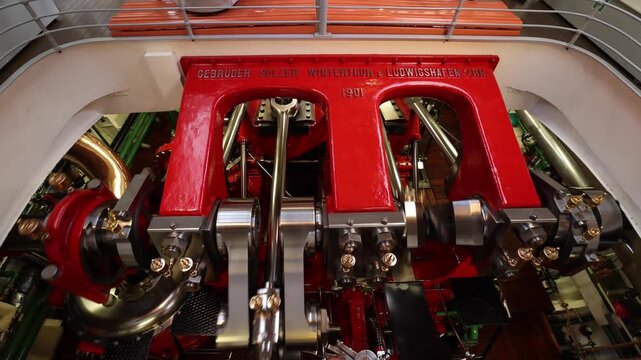 View of the historic 1901 Gebruder Sulzer steam engine in operation on a paddle steamer on Lake Lucerne in Lucerne, Lucerne, Switzerland.