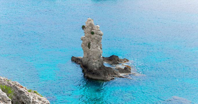 lonely cliff in tranquil water clean tropic lagoon beautiful natural environment space aerial shop