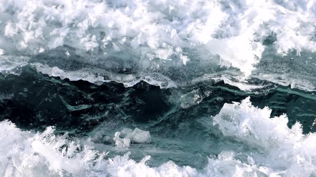 View of intricate ice cracks and frozen textures on the surface of Lake Baikal in Khuzhir, Irkutsk Oblast, Russia.
