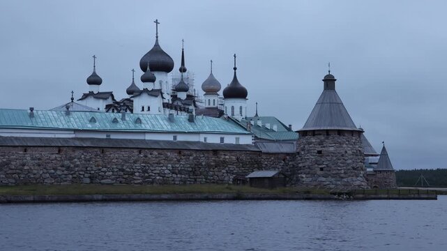 View of the historic Solovetsky Monastery with its stone walls and onion domes situated on the Solovetsky Islands in Solovetsky, Arkhangelsk Oblast, Russia.