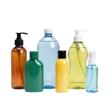 Assorted plastic bottles with pump dispensers, spray nozzles, and caps in various colors and sizes isolated on a transparent background