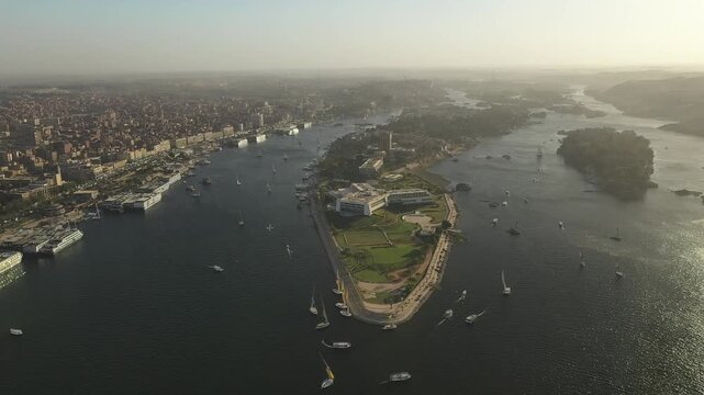 Elephantine Island, Aswan, Egypt, Nile River Landscape Flying Forward Aerial DJI Drone Raw Footage