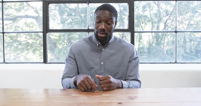 Close up of people talking to the camera, businessman explaining concepts, gesturing with hands whil