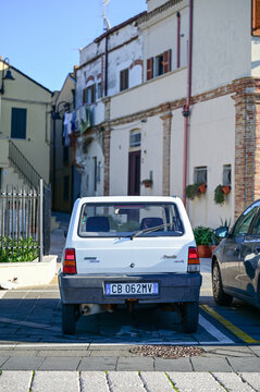 White 1980s Fiat Panda 141 with Campobasso province license plates parked in a narrow street in the old town; a modern classic; Termoli, Molise, Italy 29.11.2025