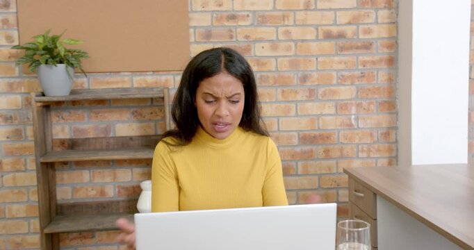 Lifestyle videos indoor of people doing activities at office, working on laptop, woman in yellow swe