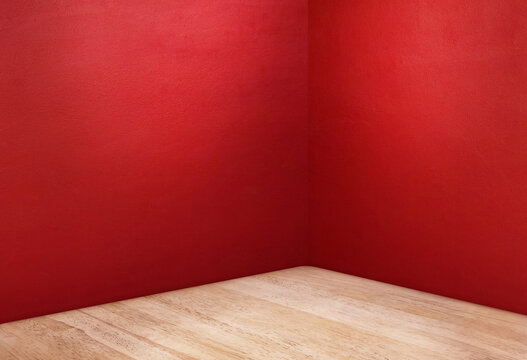Red empty room corner background with wooden floor for product display.