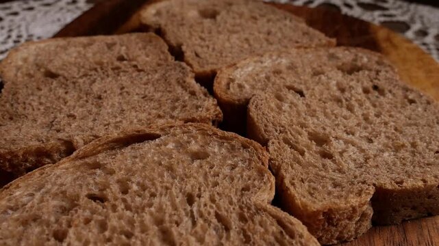 Wholegrain Bread Slices Arranged in Cross Pattern, Top-Down Crumb Texture Detail