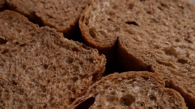 Wholegrain Bread Slices Arranged in Cross Pattern, Top-Down Crumb Texture Detail