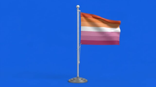 Lesbian pride flag waving on a flagpole against a blue background, symbolizing LGBTQ+ community and rights.
