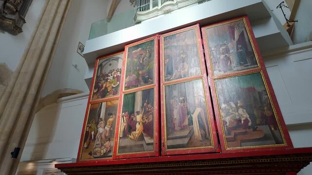 Historic painted altarpiece displayed inside Saint Mary Evangelical Cathedral in Sibiu Romania