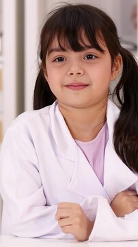 Tired Young Girl in Lab Coat Rubbing Her Eyes