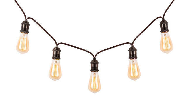 Hanging vintage Edison string light bulbs on a transparent background