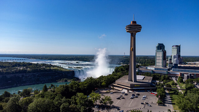 Aerial view of Skylon Tower with Niagara Falls in background. Niagara Falls, Canada - July 30, 2026.