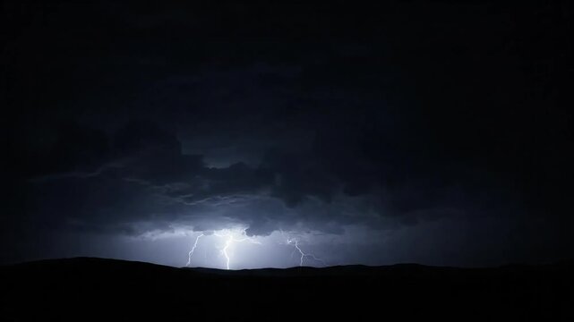 Lightning flashes illuminate storm clouds over dark horizon at night