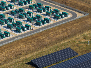 BESS Units at a Commercial Facility on a Sunny Afternoon © Tom