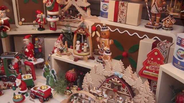 Christmas shop display with wooden nutcrackers and decorative holiday ornaments in European market window.