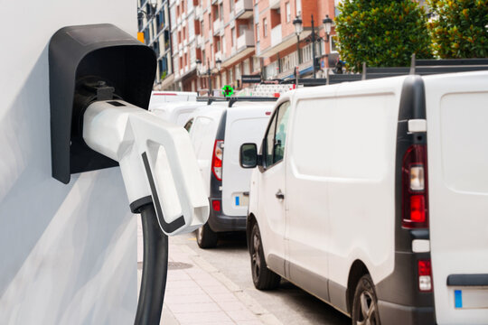Electric delivery van with electric vehicles charging station.