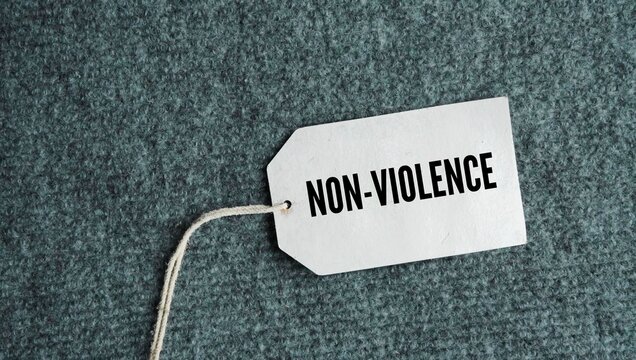 Tag the paper with the word non-violence. the personal practice or political policy of refusing to use physical force or violent action, especially when trying to create social or political change.
