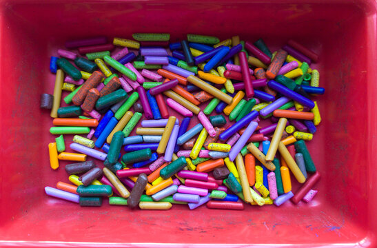 Box plenty of used wax crayons