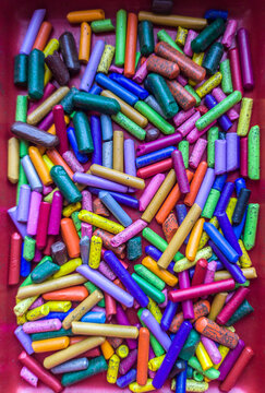 Box plenty of used wax crayons