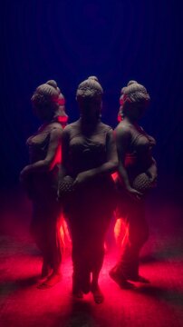 Mystic Dark Fantasy Motion Background of Sculpted Statues in Circle with Dual Tone Blue Red Lighting
