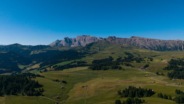  Alpe di Siusi the Dolomite plateau and the largest high-elevation Alpine meadow in Europe located in Italy's South Tyrol province in the Dolomites in summer. Stock Photo