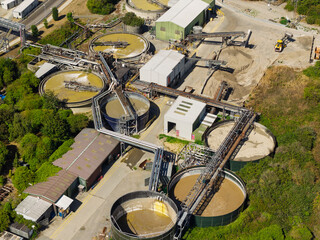 Aerial View of an Industrial Water Treatment Facility Processing Liquid Waste During a Sunny Day © Tom