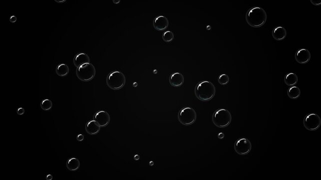 Numerous translucent soap spheres float gracefully upward through the dark murky liquid of an unknown aquatic environment, creating mesmerizing patterns within the deep darkness